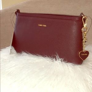 Crossbody bag Calvin Klein color plum.